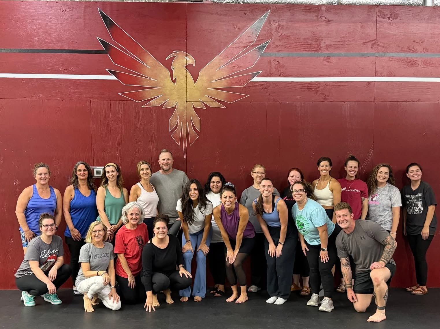 A private group gathered together after an indoor yoga class